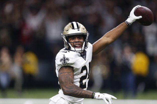 New Orleans Saints strong safety Vonn Bell (24) returns a fumble to the end zone that was called back after the ruling on the field was down by contact, in the second half of an NFL wild-card playoff football game against the Minnesota Vikings, Sunday, Jan. 5, 2020, in New Orleans. (AP Photo/Butch Dill)