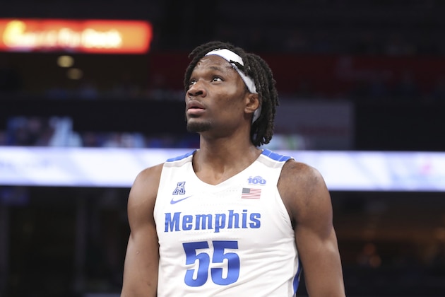 Memphis' forward Precious Achiuwa (55) pauses on the court in the second half of an NCAA college basketball game against Tulane Monday, Dec. 30, 2019, in Memphis, Tenn. (AP Photo/Karen Pulfer Focht)