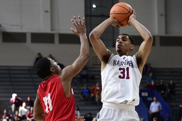 PHILADELPHIA, PA - MARCH 10: Seth Towns #31 of the Harvard Crimson shoots the ball against Terrance McBride #11 of the Cornell Big Red during the first half of a semifinal round matchup in the Ivy League Men's Basketball Tournament at The Palestra on March 10, 2018 in Philadelphia, Pennsylvania. Harvard defeated Cornell 74-55. (Photo by Corey Perrine/Getty Images)