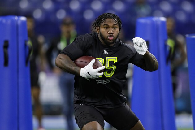 Georgia running back D'Andre Swift runs a drill at the NFL football scouting combine in Indianapolis, Friday, Feb. 28, 2020. (AP Photo/Michael Conroy)