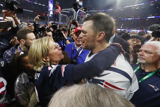 ATLANTA, GA - FEBRUARY 03: Tom Brady #12 of the New England Patriots hugs his mother Galynn after the Patriots defeat the Los Angeles Rams 13-3 during Super Bowl LIII at Mercedes-Benz Stadium on February 3, 2019 in Atlanta, Georgia.  (Photo by Jamie Squire/Getty Images)