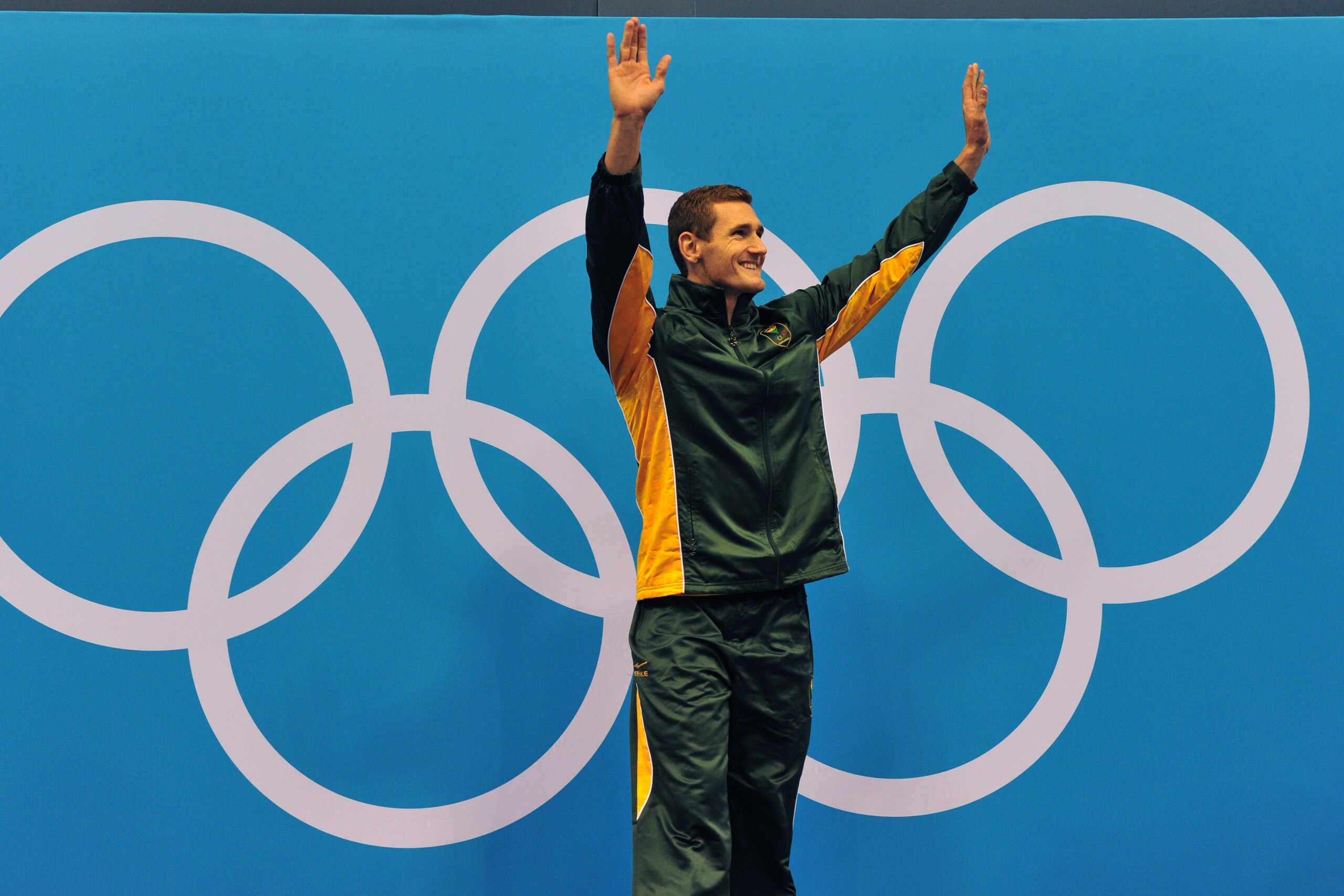 South Africa's gold medalist Cameron Van der Burgh poses on the podium after the men's 100m breaststroke swimming event at the London 2012 Olympic Games on July 29, 2012 in London. AFP PHOTO / CHRISTOPHE SIMON (Photo credit should read CHRISTOPHE SIMON/AFP/GettyImages) South Africa's gold medalist Cameron Van der Burgh poses on the podium after the men's 100m breaststroke swimming event at the London 2012 Olympic Games on July 29, 2012 in London. AFP PHOTO / CHRISTOPHE SIMON (Photo credit should read CHRISTOPHE SIMON/AFP/GettyImages)