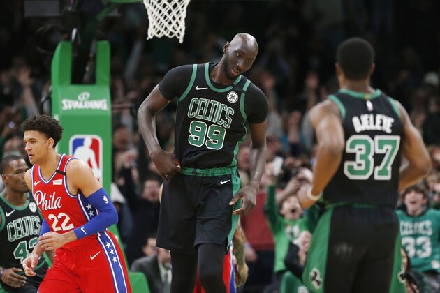 Boston Celtics' Tacko Fall (99) reacts after scoring during the second half of an NBA basketball game against the Philadelphia 76ers in Boston, Saturday, Feb. 1, 2020. (AP Photo/Michael Dwyer)