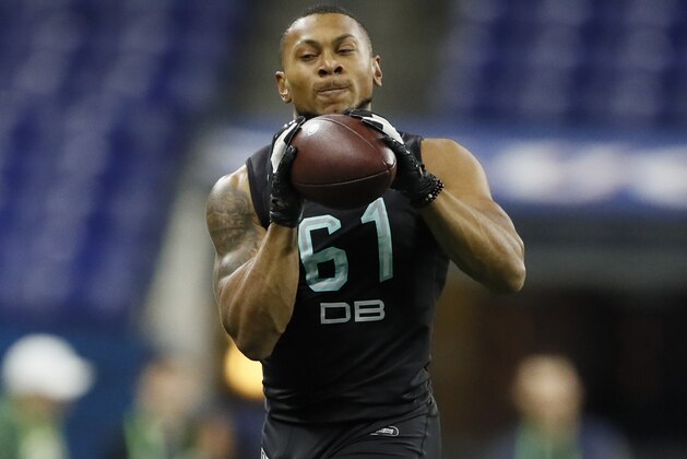 Minnesota defensive back Antoine Winfield Jr. runs a drill at the NFL football scouting combine in Indianapolis, Sunday, March 1, 2020. (AP Photo/Charlie Neibergall)
