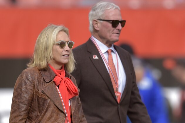 File-This Nov. 4, 2018, file photo shows, Cleveland Browns owners Dee and Jimmy Haslam walk on the field prior to an NFL football game against the Kansas City Chiefs, in Cleveland. The Browns owners have bought the Columbus Crew, guaranteeing the team will not relocate. The Haslams have been working for months with the a group to keep the Major League Soccer franchise in Ohio.  (AP Photo/David Richard, File)