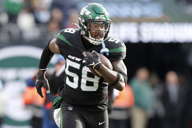 EAST RUTHERFORD, NEW JERSEY - DECEMBER 08:  (NEW YORK DAILIES OUT)   James Burgess #58 of the New York Jets in action against the Miami Dolphins at MetLife Stadium on December 08, 2019 in East Rutherford, New Jersey. The Jets defeated the Dolphins 22-21. (Photo by Jim McIsaac/Getty Images)