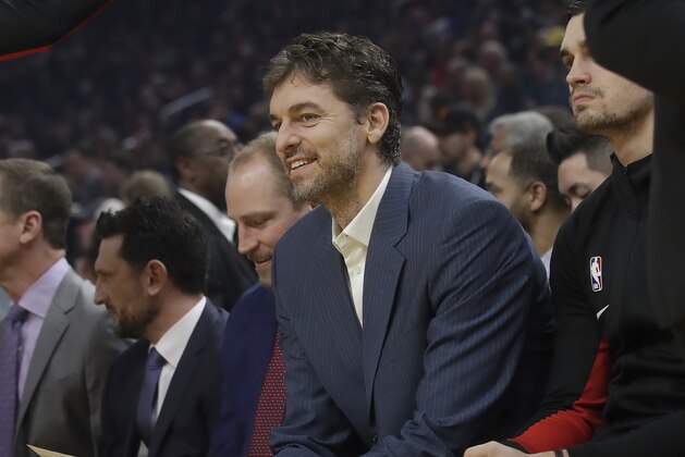 Injured Portland Trail Blazers player Pau Gasol sits on the bench during an NBA basketball game between the Golden State Warriors and the Trail Blazers in San Francisco, Monday, Nov. 4, 2019. (AP Photo/Jeff Chiu)