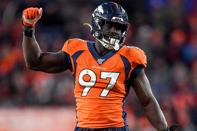 DENVER, CO - DECEMBER 29:  Jeremiah Attaochu #97 of the Denver Broncos celebrates after a fourth quarter sack against the Oakland Raiders at Empower Field at Mile High on December 29, 2019 in Denver, Colorado.  (Photo by Dustin Bradford/Getty Images)