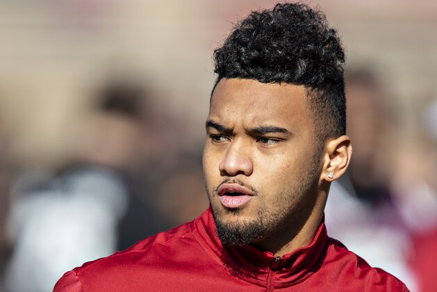 FAYETTEVILLE, AR - NOVEMBER 9:   Tua Tagovailoa #13 of the Alabama Crimson Tide warms up before a game against the Mississippi State Bulldogs at Davis Wade Stadium on November 16, 2019 in Starkville, Mississippi.  The Crimson Tide defeated the Bulldogs 38-7.  (Photo by Wesley Hitt/Getty Images)