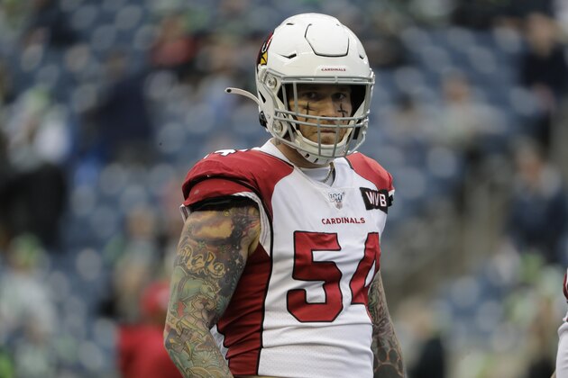 Arizona Cardinals linebacker Cassius Marsh stands on the field during warmups before an NFL football game against the Seattle Seahawks, Sunday, Dec. 22, 2019, in Seattle. (AP Photo/Lindsey Wasson)