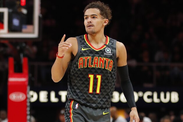 ATLANTA, GA - MARCH 09: Trae Young #11 of the Atlanta Hawks reacts during the second half of an NBA game against the Charlotte Hornets at State Farm Arena on March 9, 2020 in Atlanta, Georgia. NOTE TO USER: User expressly acknowledges and agrees that, by downloading and/or using this photograph, user is consenting to the terms and conditions of the Getty Images License Agreement. (Photo by Todd Kirkland/Getty Images)