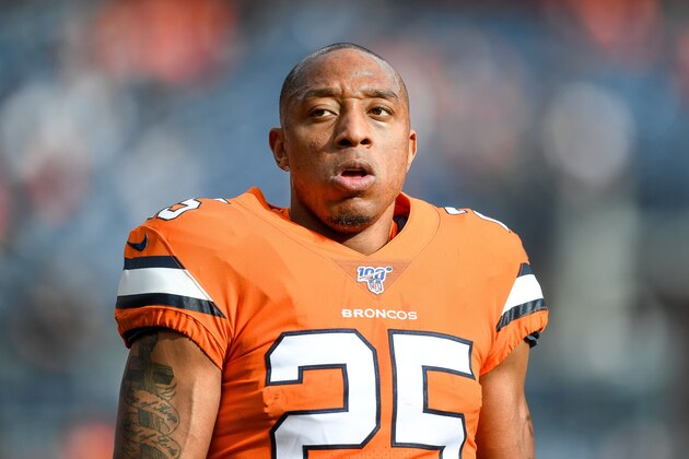 DENVER, CO - DECEMBER 22:  Chris Harris #25 of the Denver Broncos stands on the field as he warms up before a game against the Detroit Lions at Empower Field at Mile High on December 22, 2019 in Denver, Colorado.  (Photo by Dustin Bradford/Getty Images)