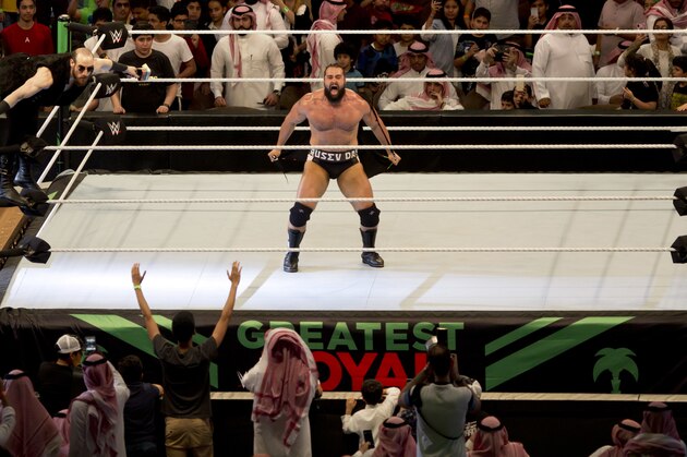 World Wrestling star Rusev is greeted by fans during his match of the