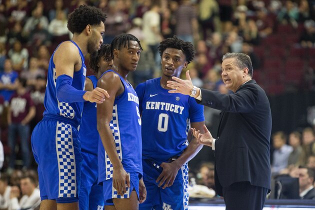 Kentucky head coach John Calipari talks to his team during a timeout against Texas A&M during the second half of an NCAA college basketball game Tuesday, Feb. 25, 2020, in College Station, Texas. (AP Photo/Sam Craft)