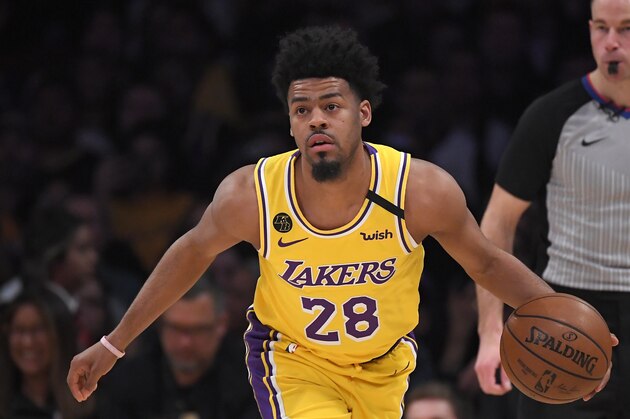 Los Angeles Lakers guard Quinn Cook dribbles during the second half of an NBA basketball game against the San Antonio Spurs Wednesday, Feb. 5, 2020, in Los Angeles. The Lakers won 129-102. (AP Photo/Mark J. Terrill)