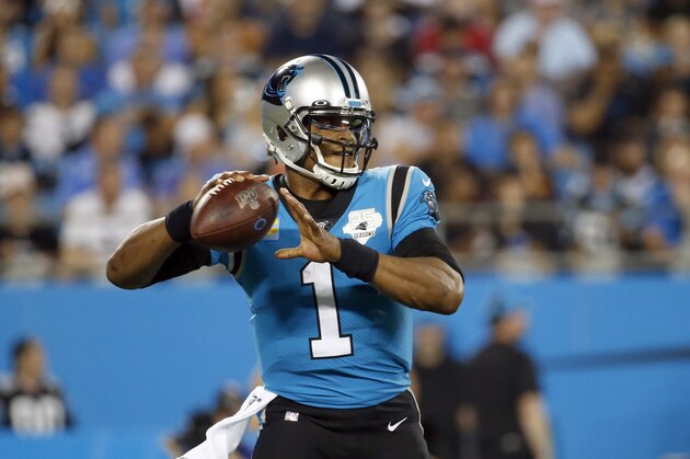 Carolina Panthers quarterback Cam Newton (1) passes against the Tampa Bay Buccaneers during the first half of an NFL football game in Charlotte, N.C., Thursday, Sept. 12, 2019. (AP Photo/Brian Blanco)