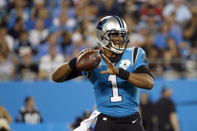 Carolina Panthers quarterback Cam Newton (1) passes against the Tampa Bay Buccaneers during the first half of an NFL football game in Charlotte, N.C., Thursday, Sept. 12, 2019. (AP Photo/Brian Blanco)