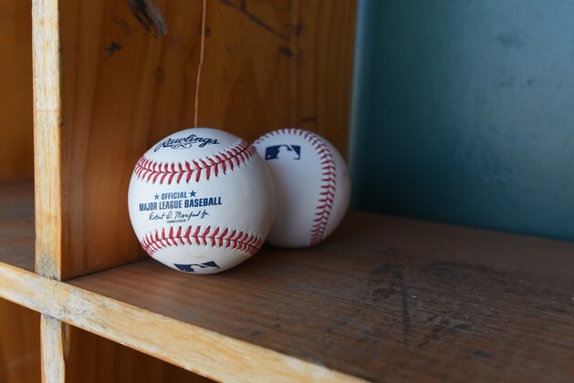 LAKELAND, FL - MARCH 01: A detailed view of a pair of official Rawlings Major League Baseball baseballs with the imprinted signature of Robert D. Manfred Jr., the Commissioner of Major League Baseball, sitting in the dugout prior to the Spring Training game between the New York Yankees and the Detroit Tigers at Publix Field at Joker Marchant Stadium on March 1, 2020 in Lakeland, Florida. The Tigers defeated the Yankees 10-4. (Photo by Mark Cunningham/MLB Photos via Getty Images) LAKELAND, FL - MARCH 01: A detailed view of a pair of official Rawlings Major League Baseball baseballs with the imprinted signature of Robert D. Manfred Jr., the Commissioner of Major League Baseball, sitting in the dugout prior to the Spring Training game between the New York Yankees and the Detroit Tigers at Publix Field at Joker Marchant Stadium on March 1, 2020 in Lakeland, Florida. The Tigers defeated the Yankees 10-4. (Photo by Mark Cunningham/MLB Photos via Getty Images)