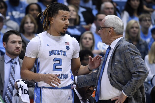 CHAPEL HILL, NORTH CAROLINA - FEBRUARY 01: Cole Anthony #2 talks with head coach Roy Williams of the North Carolina Tar Heels  during the first half of their game  against the Boston College Eaglesat the Dean Smith Center on February 01, 2020 in Chapel Hill, North Carolina. (Photo by Grant Halverson/Getty Images)
