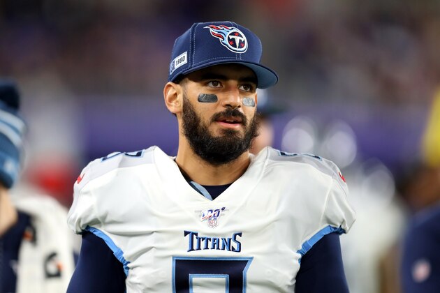 BALTIMORE, MARYLAND - JANUARY 11: Marcus Mariota #8 of the Tennessee Titans stands on the sideline in the AFC Divisional Playoff game against the Baltimore Ravens at M&T Bank Stadium on January 11, 2020 in Baltimore, Maryland. (Photo by Maddie Meyer/Getty Images)