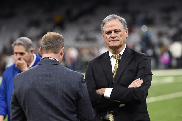 New Orleans Saints general manager Mickey Loomis stands on the field before an NFL football game against the Carolina Panthers in New Orleans, Sunday, Dec. 30, 2018. (AP Photo/Bill Feig)
