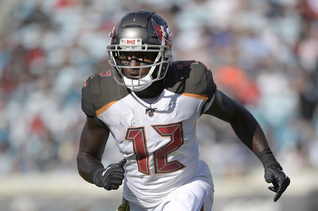 Tampa Bay Buccaneers wide receiver Chris Godwin (12) runs a route during the first half of an NFL football game against the Jacksonville Jaguars Sunday, Dec. 1, 2019, in Jacksonville, Fla. (AP Photo/Phelan M. Ebenhack)