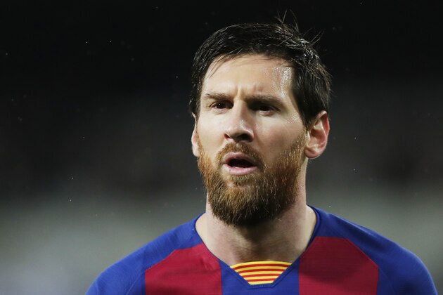 Barcelona's Lionel Messi attends the Spanish La Liga soccer match between Real Madrid and Barcelona at the Santiago Bernabeu stadium in Madrid, Spain, Sunday, March 1, 2020. (AP Photo/Manu Fernandez)