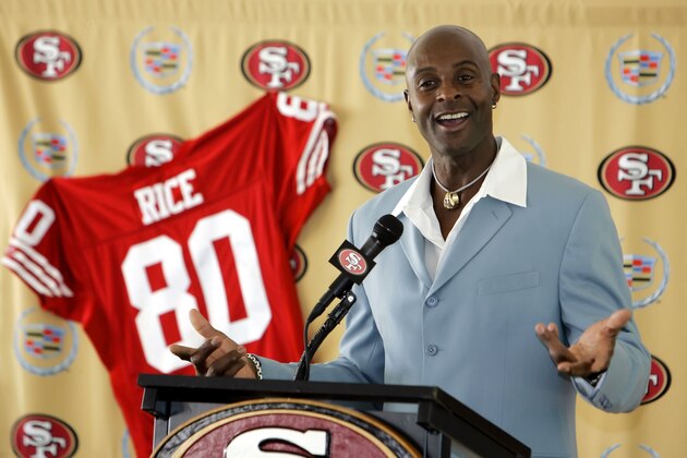 Wide receiver Jerry Rice smiles and answers questions after signing a one-day contract with the San Francisco 49ers during a press conference at the 49ers football headquarters in Santa Clara, Calif., Thursday Aug. 24, 2006. The 49ers will hold an official retirement ceremony for Rice at a game in November. (AP Photo/Eric Risberg)