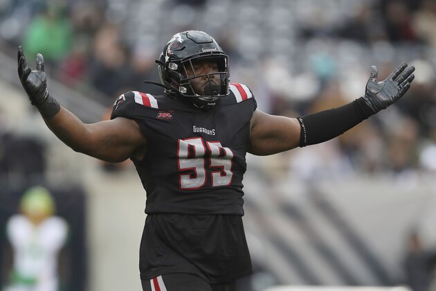 New York Guardians defensive tackle Cavon Walker (99) reacts after a play during an XFL football game against the Tampa Bay Vipers, Sunday, Feb. 9, 2020, in East Rutherford, N.J. The New York Guardians won 23-3. (AP Photo/Steve Luciano) New York Guardians defensive tackle Cavon Walker (99) reacts after a play during an XFL football game against the Tampa Bay Vipers, Sunday, Feb. 9, 2020, in East Rutherford, N.J. The New York Guardians won 23-3. (AP Photo/Steve Luciano)