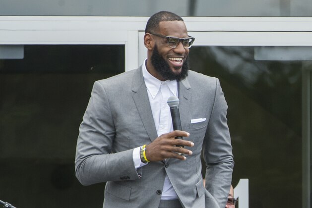 LeBron James speaks at the opening ceremony for the I Promise School in Akron, Ohio, Monday, July 30, 2018. The I Promise School is supported by the The LeBron James Family Foundation and is run by the Akron Public Schools. (AP Photo/Phil Long)