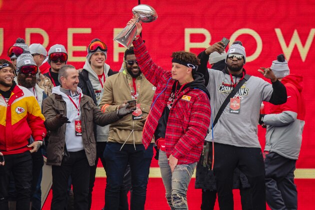 KANSAS CITY, MO - FEBRUARY 05: Members of the Kansas City Chiefs celebrate on stage with the Vince Lombardi Trophy during the Kansas City Chiefs Victory Parade on February 5, 2020 in Kansas City, Missouri. (Photo by Kyle Rivas/Getty Images)