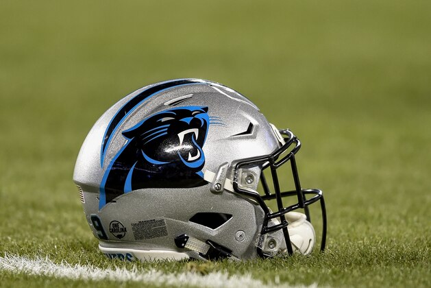A against the Carolina Panthers helmet sits on the field before the start of a NFL football game between the Carolina Panthers and the New Orleans Saints in Charlotte, N.C., Monday, Dec. 17, 2018. (AP Photo/Mike McCarn)