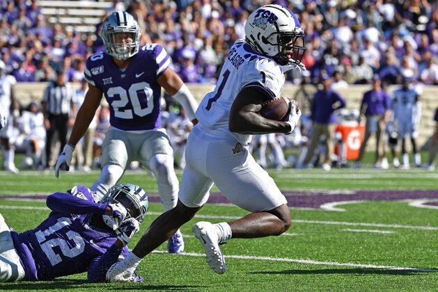 MANHATTAN, KS - OCTOBER 19:  Wide receiver Jalen Reagor #1 of the TCU Horned Frogs turns up field against defensive back AJ Parker #12 of the Kansas State Wildcats during the first half at Bill Snyder Family Football Stadium on October 19, 2019 in Manhattan, Kansas. (Photo by Peter G. Aiken/Getty Images)