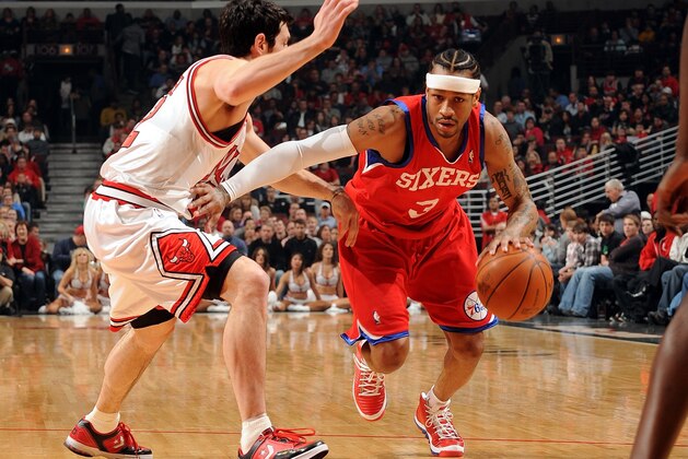 CHICAGO - FEBRUARY 20:  Allen Iverson #3 of the Philadelphia 76ers makes a move to the basket against Kirk Hinrich #12 of the Chicago Bulls during the game at United Center on February 20, 2010 in Chicago, Illinois.  The Bulls won 122-90.  NOTE TO USER: User expressly acknowledges and agrees that, by downloading and/or using this Photograph, user is consenting to the terms and conditions of the Getty Images License Agreement. Mandatory Copyright Notice: Copyright 2010 NBAE (Photo by Randy Belice/NBAE via Getty Images)