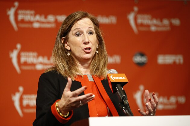 FILE - In this Sept. 29, 2019, file photo, WNBA Commissioner Cathy Engelbert speaks at a news conference before Game 1 of basketball's WNBA Finals between the Connecticut Sun and the Washington Mystics, in Washington. The WNBA draft will be a virtual event this year. The league announced Thursday, March 26, 2020, that its draft will still be held April 17 as originally scheduled, but without players, fans or media in attendance due to the coronavirus pandemic.  “The WNBA draft is a time to celebrate the exceptional athletes whose hard work and dreams are realized with their selections in the draft,” WNBA Commissioner Cathy Engelbert said. (AP Photo/Patrick Semansky, File)