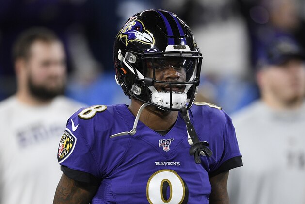 Baltimore Ravens quarterback Lamar Jackson (8) warms up before an NFL divisional playoff football game against the Tennessee Titans, Saturday, Jan. 11, 2020, in Baltimore. (AP Photo/Nick Wass)