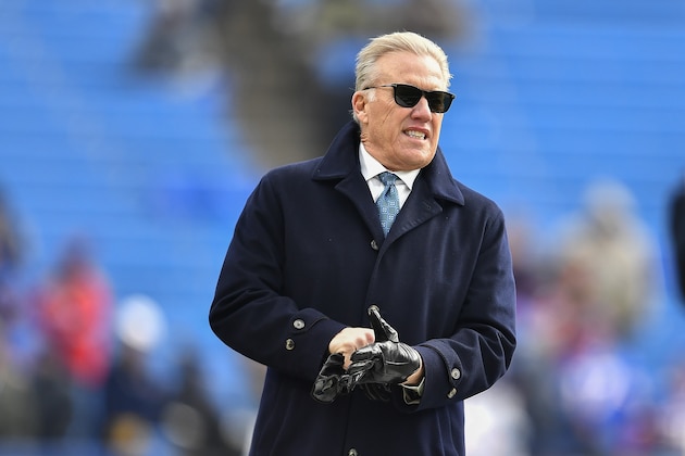 Denver Broncos general manager John Elway, walks on the field before an NFL football game between the Buffalo Bills and the Denver Broncos, Sunday, Nov. 24, 2019, in Orchard Park, N.Y. (AP Photo/Adrian Kraus)