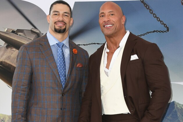 HOLLYWOOD, CALIFORNIA - JULY 13:  Roman Reigns and Dwayne Johnson attend the Premiere Of Universal Pictures'