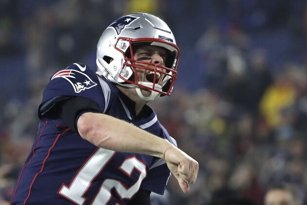 New England Patriots quarterback Tom Brady charges onto the field to warm up before an NFL wild-card playoff football game against the Tennessee Titans, Saturday, Jan. 4, 2020, in Foxborough, Mass. (AP Photo/Elise Amendola)