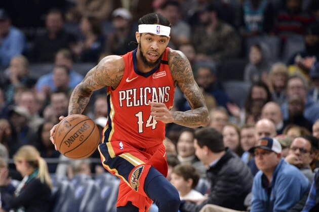 New Orleans Pelicans forward Brandon Ingram (14) handles the ball in the first half of an NBA basketball game against the Memphis Grizzlies Monday, Jan. 20, 2020, in Memphis, Tenn. (AP Photo/Brandon Dill)