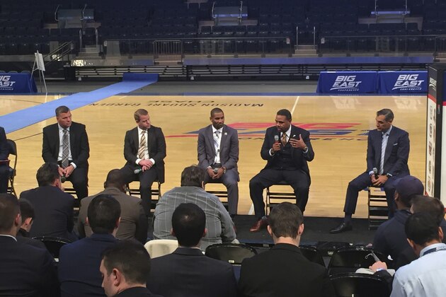 From left to right, moderator Tarik Turner Moderator; Creighton coach Greg McDermott; Marquette coach Steve Wojciechowski; Butler coach LaVall Jordan; Providence coach Ed Cooley and Villanova coach Jay Wright chat during Big East NCAA college basketball media day in New York. (AP Photo/Paul Montello)