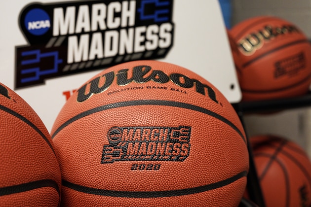 Official March Madness 2020 tournament basketballs are seen in a store room at the CHI Health Center Arena, in Omaha, Neb., Monday, March 16, 2020. Omaha was to host a first and second round in the NCAA college basketball Division I tournament, which was cancelled due to the coronavirus pandemic. (AP Photo/Nati Harnik)