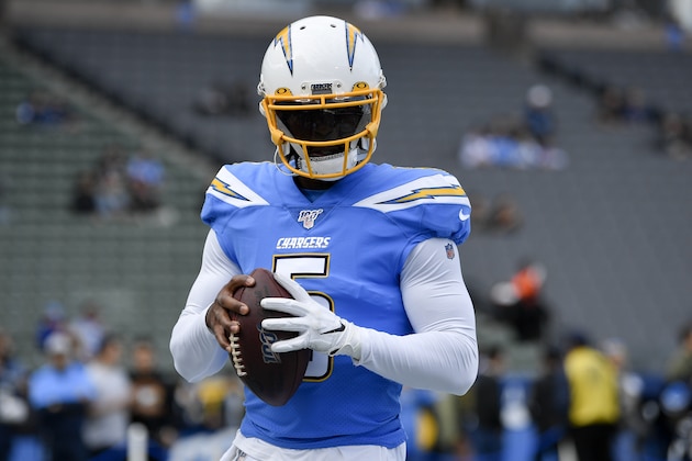Los Angeles Chargers quarterback Tyrod Taylor warms up prior to an NFL football game against the Oakland Raiders in Carson, Calif., Sunday, Dec. 22, 2019. (AP Photo/Kelvin Kuo)