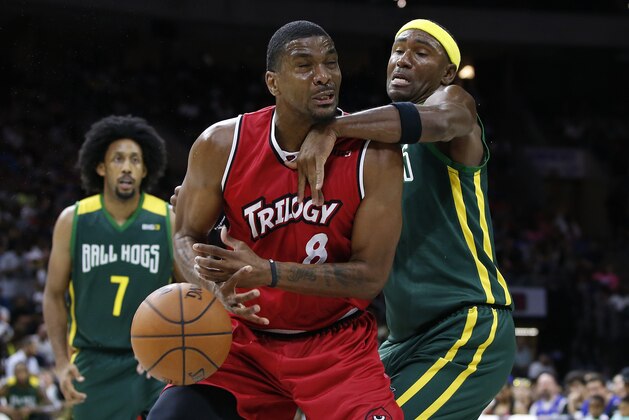 Trilogy's James White (8) loses the ball as BallHogs' Derrick Byars defends during Game 2 in the BIG3 Basketball 2League in Philadelphia, Pa., Sunday, July 16, 2017. (AP Photo/Rich Schultz)