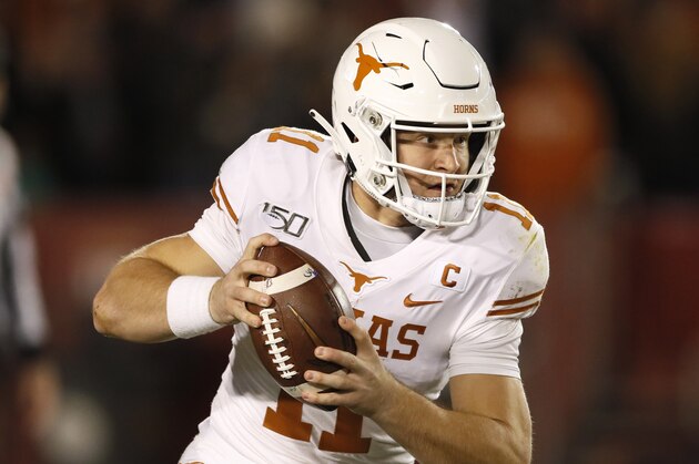 Texas quarterback Sam Ehlinger runs up field during the second half of an NCAA college football game against Iowa State, Saturday, Nov. 16, 2019, in Ames, Iowa. Iowa State won 23-21. (AP Photo/Charlie Neibergall)