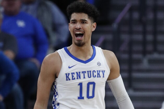Kentucky's Johnny Juzang (10) reacts after a play against Utah during the first half of an NCAA college basketball game Wednesday, Dec. 18, 2019, in Las Vegas. (AP Photo/John Locher)
