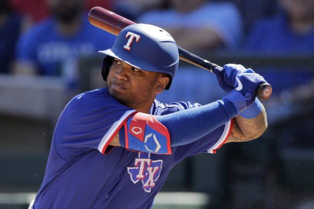 Texas Rangers' Willie Calhoun bats during the first inning of a spring training baseball game against the Chicago White Sox Saturday, Feb. 29, 2020, in Surprise, Ariz. (AP Photo/Charlie Riedel)