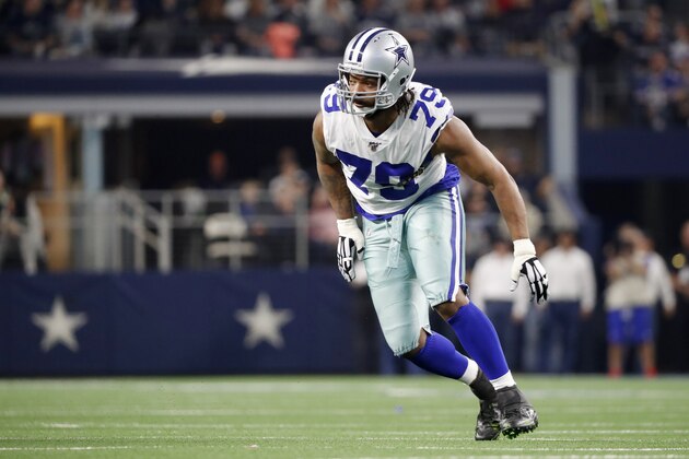 Dallas Cowboys defensive end Michael Bennett defends during the first half of an NFL football game against the Buffalo Bills in Arlington, Texas, Thursday, Nov. 28, 2019. (AP Photo/Roger Steinman)