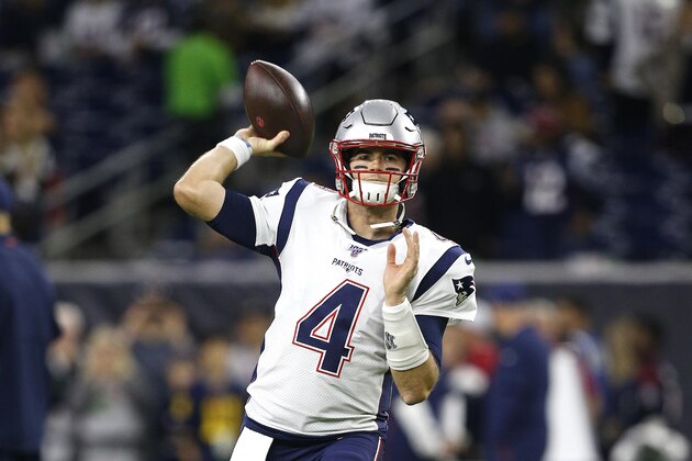 HOUSTON, TEXAS - DECEMBER 01: Jarrett Stidham #4 of the New England Patriots warms up prior to the game against the Houston Texans at NRG Stadium on December 01, 2019 in Houston, Texas. (Photo by Bob Levey/Getty Images)