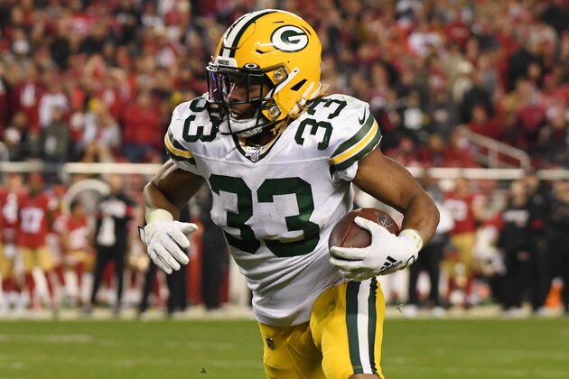 SANTA CLARA, CALIFORNIA - JANUARY 19: Aaron Jones #33 of the Green Bay Packers rushes with the ball against the San Francisco 49ers during the NFC Championship game at Levi's Stadium on January 19, 2020 in Santa Clara, California. (Photo by Harry How/Getty Images)